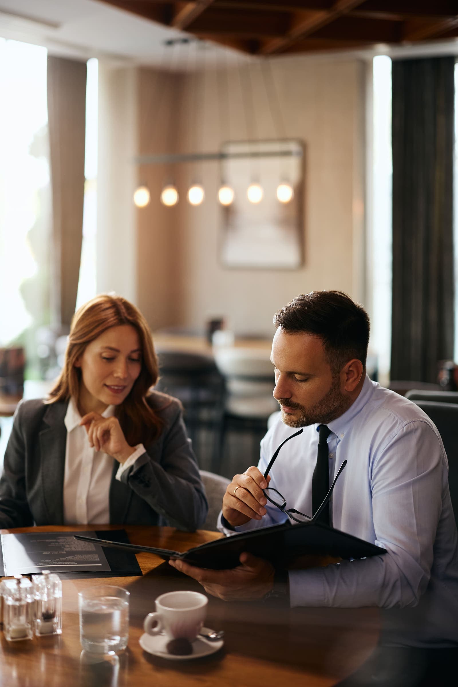 Business partners discussing a confidentiality agreement
