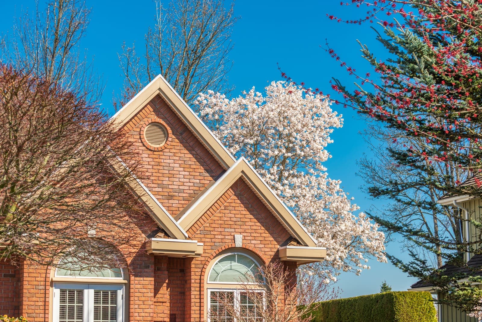 A family home held behind a structure built to protect it
