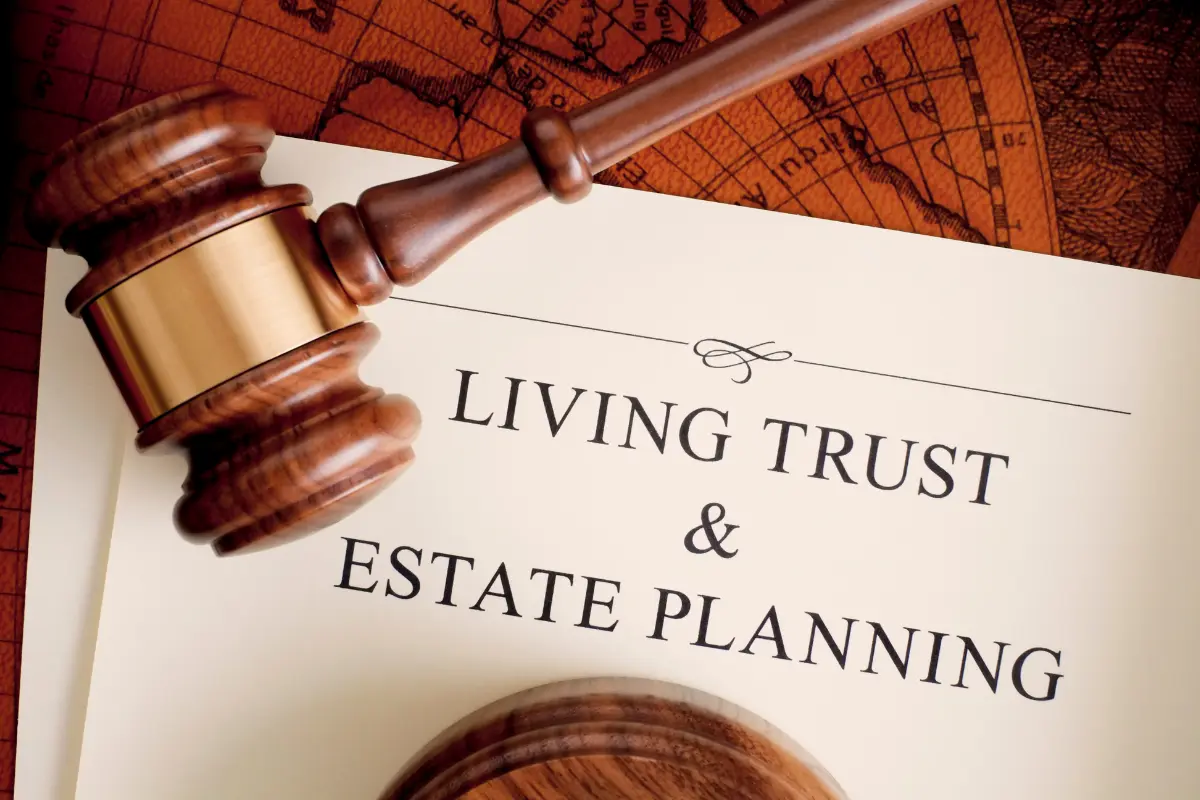 A gavel on a "Living Trust & Estate Planning" document, representing Costaras Law's expertise in estate planning and asset protection.